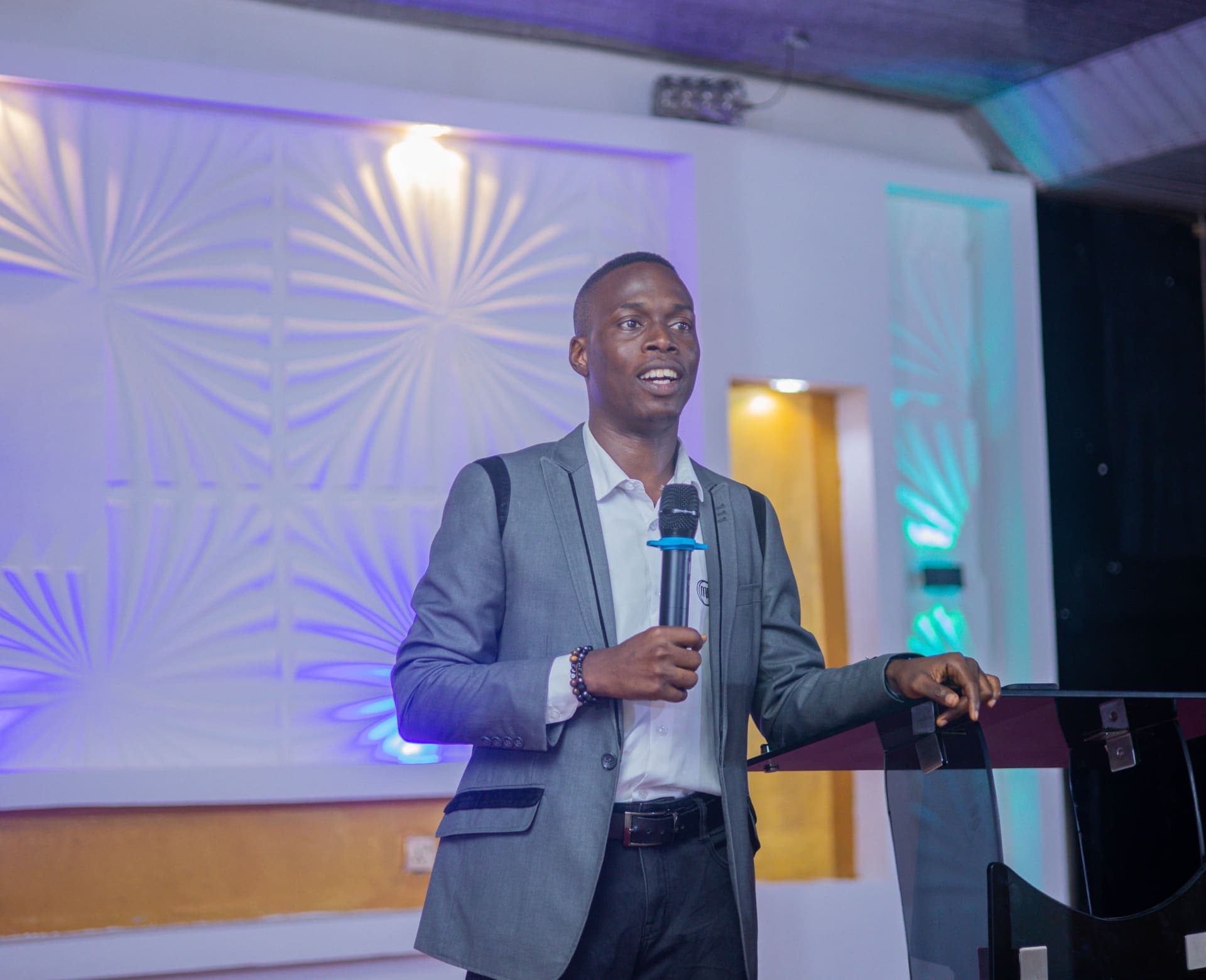Damilola Emmanuel, MJI President, speaking at the lectern during the 3F Conference