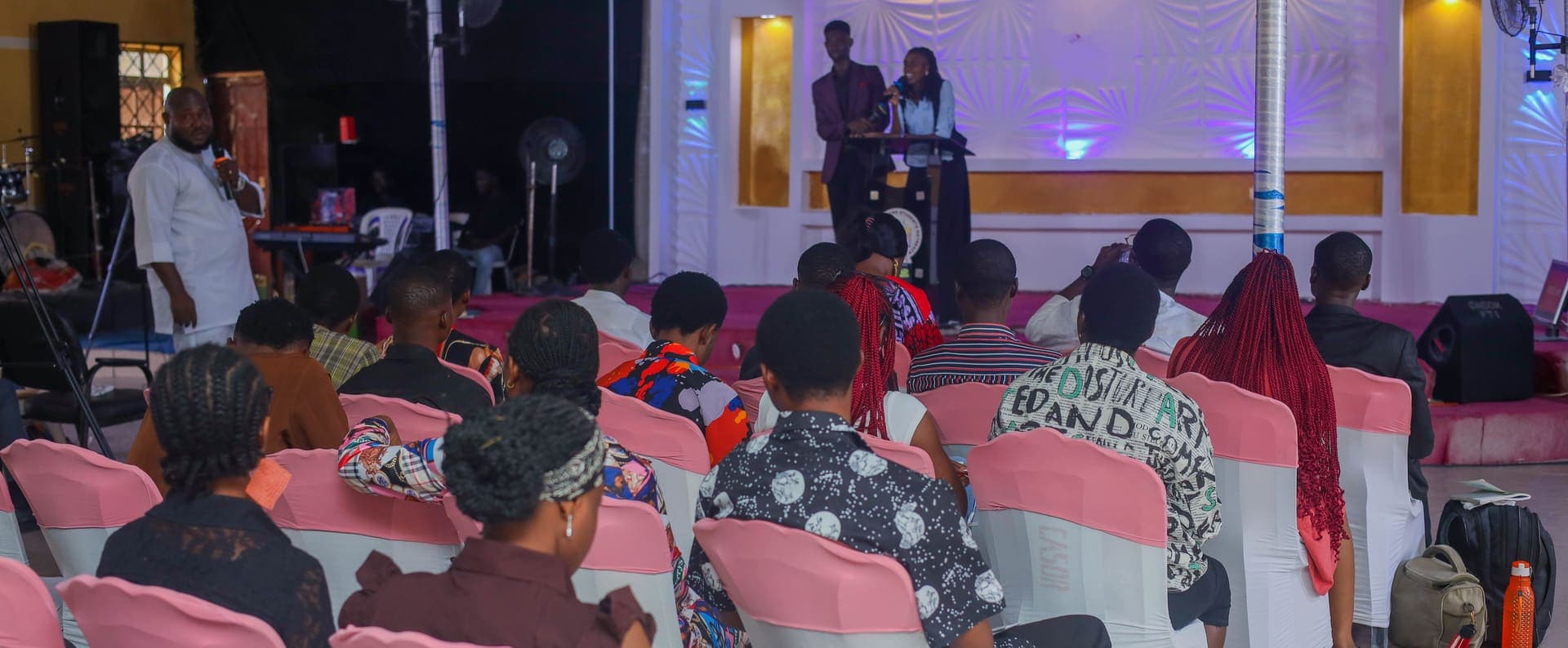 Members on stage during MJI's 3F Conference (Final, Fatal, Failure), 2025