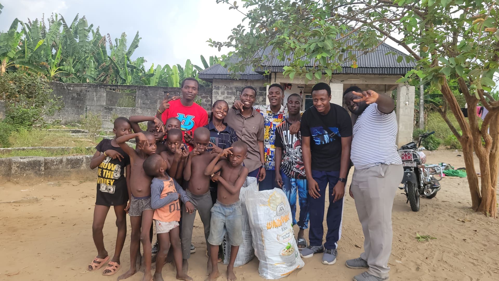 The MJI outreach team with children of Eku village after the December 2025 outreach